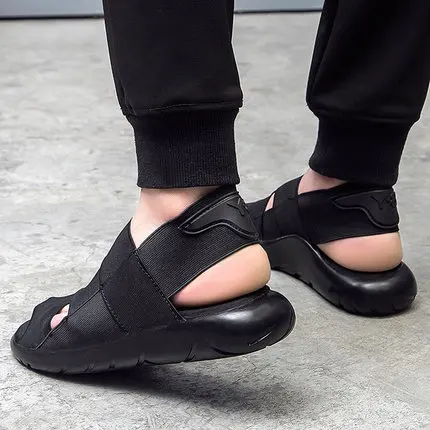 

Men's sandals men 2018 autumn new Korean version of the trend of Hong Kong wind soft bottom driving sports and leisure beach sa