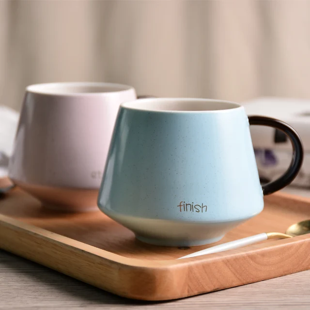 simple and elegant light colored ceramic drinking mugs coffee cups