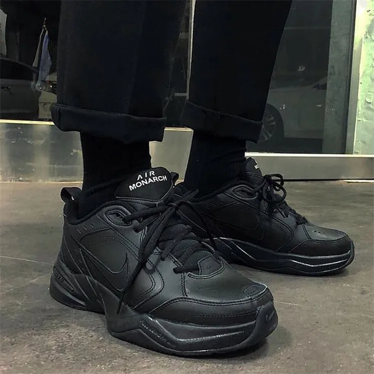 nike air monarch black on feet