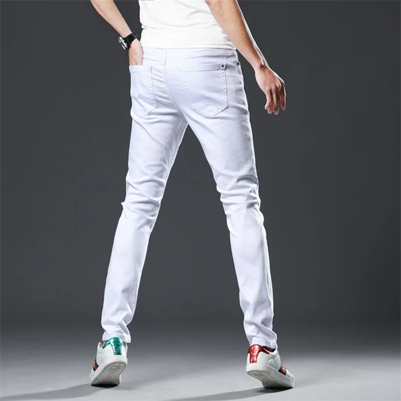 Весенние новые джинсы мужчины 100% хлопок Письмо печати fit тонкий карандаш Штаны Узкие рваные высокого качества дизайн белые джинсы мужские