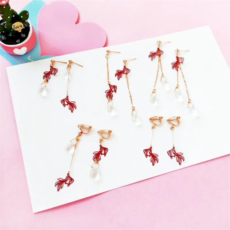 

The new jewelry source original earrings goldfish with long fringe Asymmetrical water earrings without ear clip