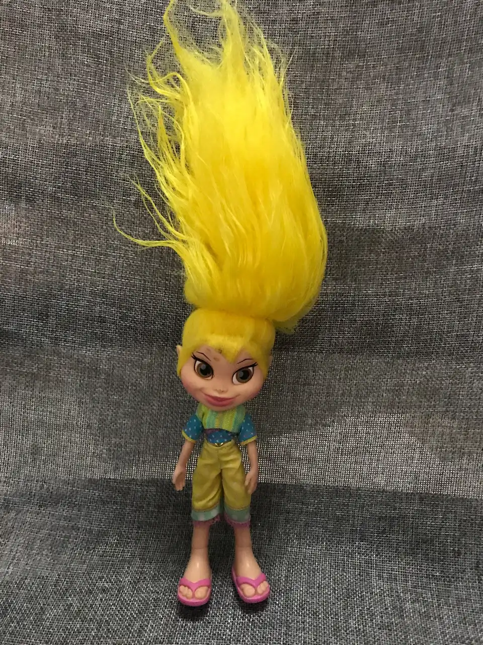 toy trolls with colored hair