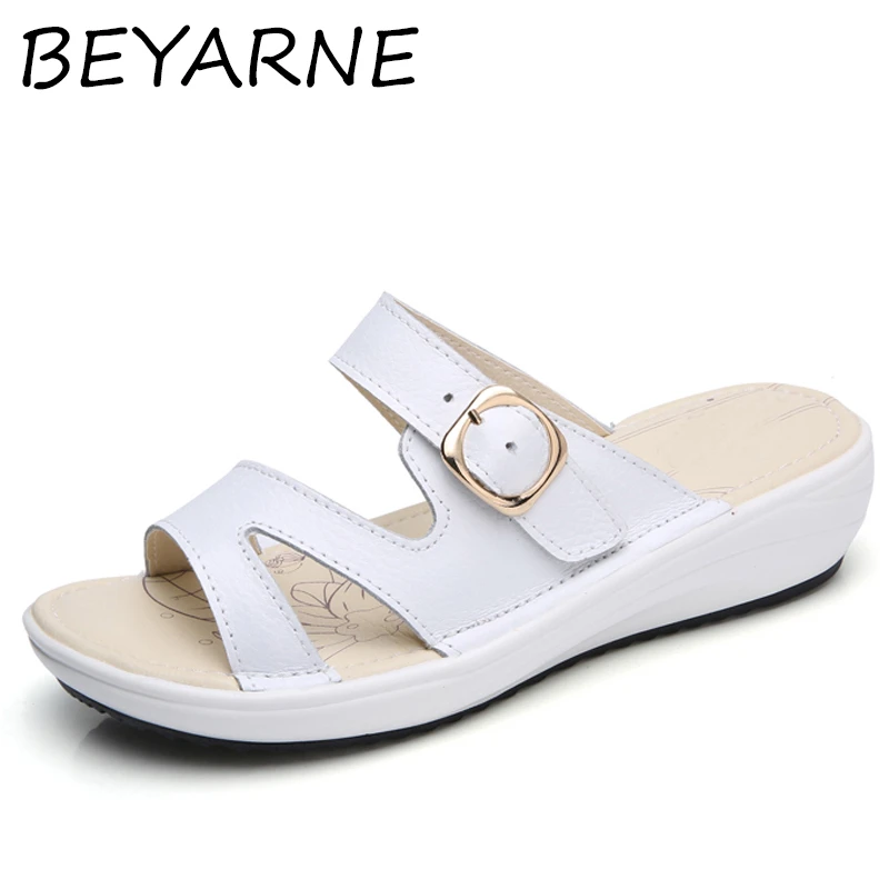 white beach slippers