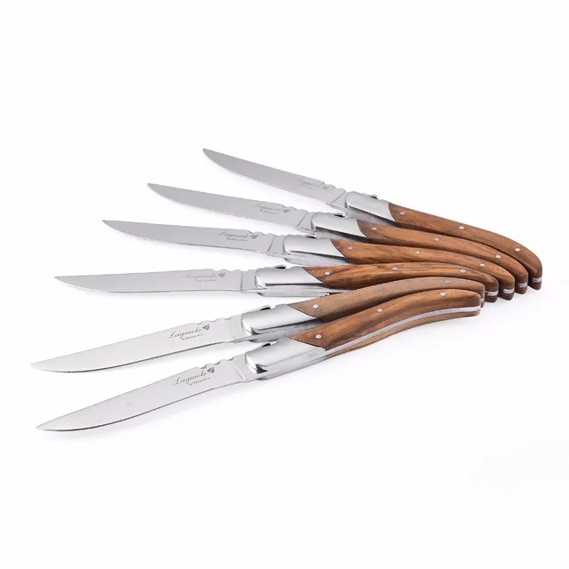 Laguiole steak knives with matt stainless steel bolsters. Wide rosewood  handles Length of handle 12 cm Steel blade Stainless 12C27Mod Bolsters 2  stainless steel bolsters in matt finish Chiseling Standard Nature of