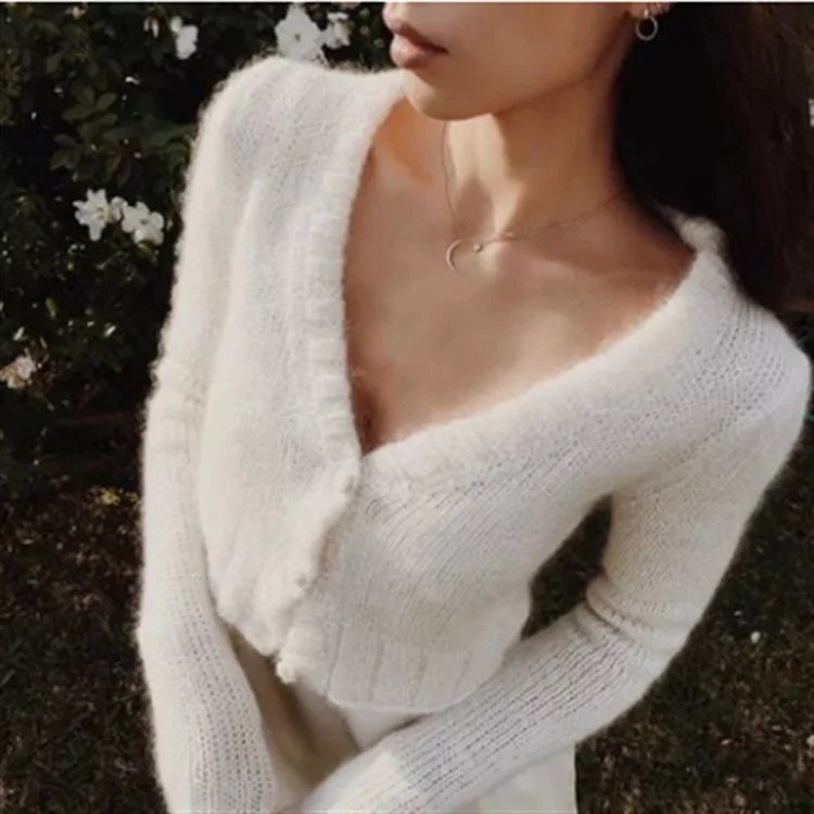 2019 autumn and winter sexy women sweaters computer knitted v-neck white and black solid button sweaters 2019 autumn and winter sexy women sweaters computer knitted v-neck white and black solid button sweaters
