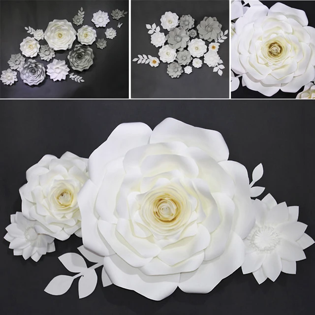giant paper flowers and green leaf party wedding decor for photo paper flower photobooth backdrop