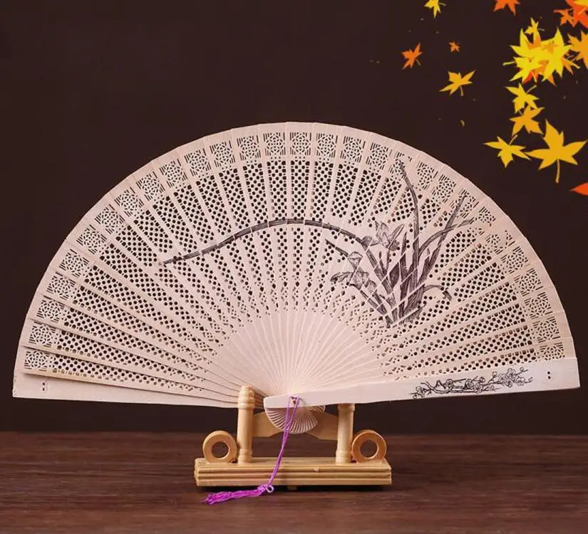 

2018 Smooth opening and closing Chinese Traditional Hollow Fan Wooden Hand Made Exquisite Folding Wedding Gift Favor 2sw0808