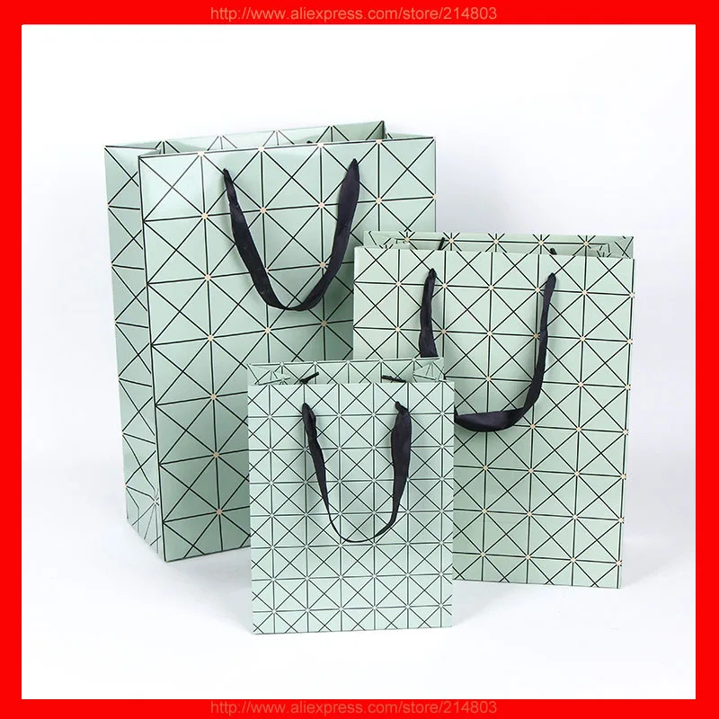 (50pcs/lot) Wholesale high quality paper gift bagin Totes from Luggage