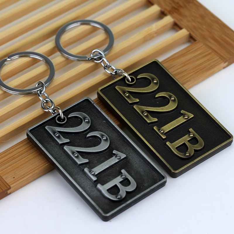 

Free shipping a lot TV series Sherlock Holmes 221B Logo Silver Plated 7cm Metal Keychain Keyring For Wen And WOmen New