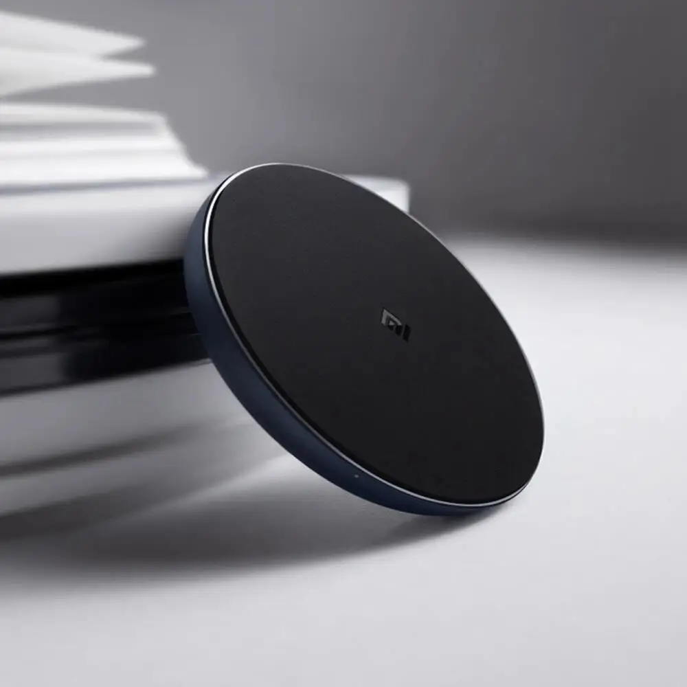 

Xiaomi wireless charger (universal fast charging) fast charging- Black color / lightweight and portable / smart security