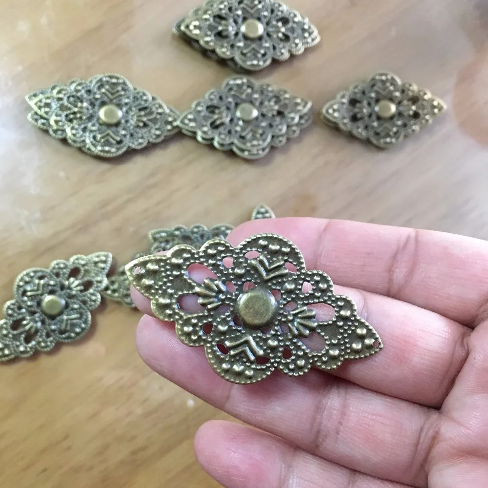 

Wholesale Bronze Metal Cabochon Filigree Hollow Heart Square Rhombus Leaf Butterfly Wraps Cabochon Embellishments DIY Crafts