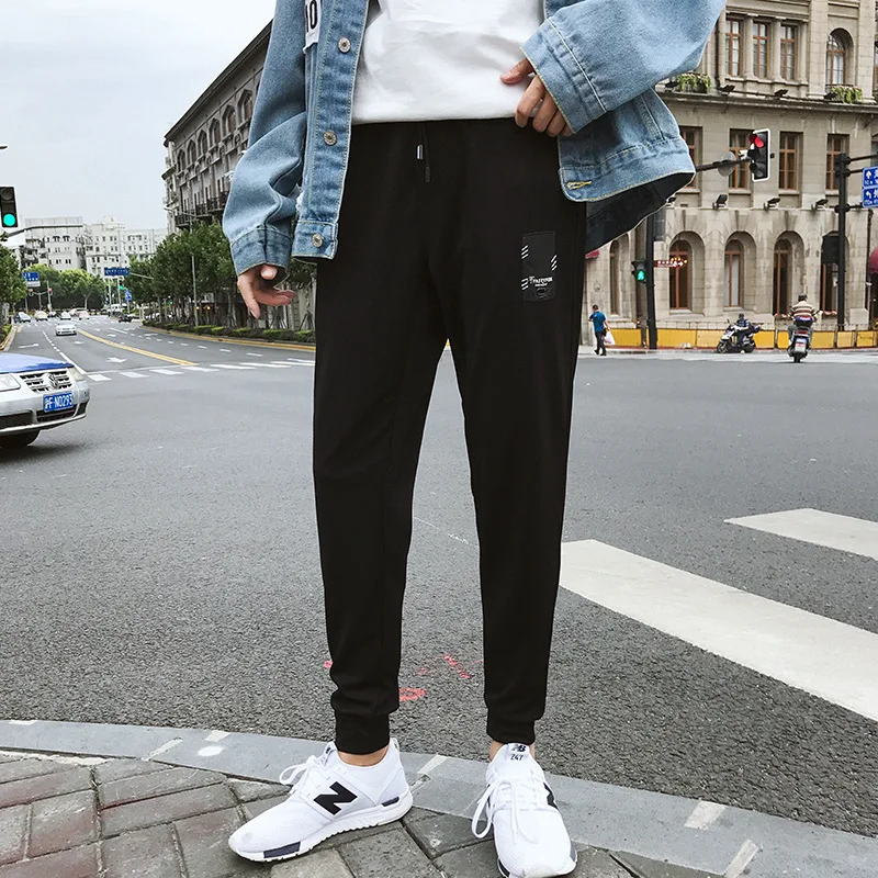 

Spring and Autumn Men's Black Casual Pants Tide Brand Feet Pants New Elastic Waist Men's Sports Fitness Casual Pants Men