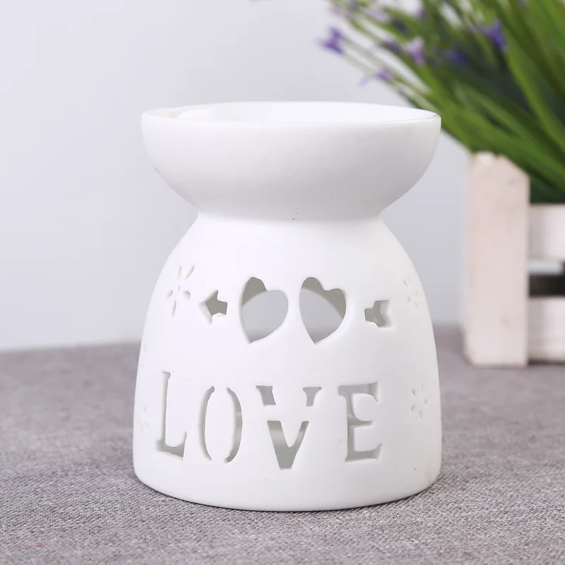 Mini Love Heart Ceramic Aroma Lamp Hollowing Candle Furnace Essential Oil Furnace Home Furnishing Decoration Q Mini Love Heart Ceramic Aroma Lamp Hollowing Candle Furnace Essential Oil Furnace Home Furnishing Decoration Q