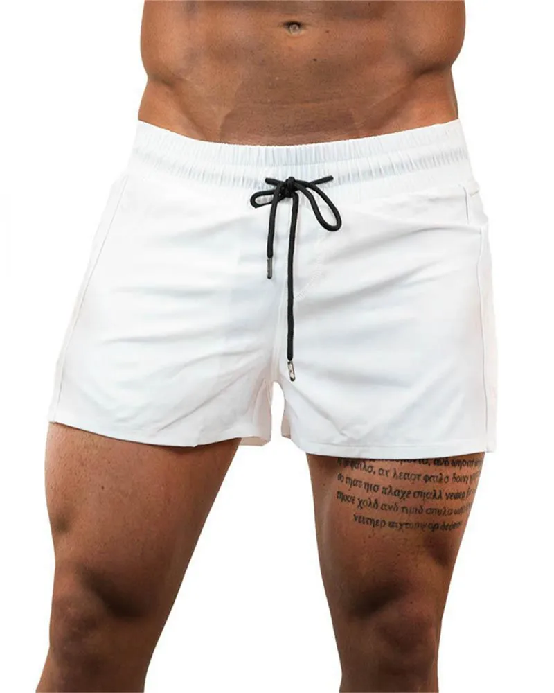 Летние Новые мужские тренировочные брюки спортивные залы тренировка сжимающая быстросохнущая полиэфирная ткань Белые Повседневные