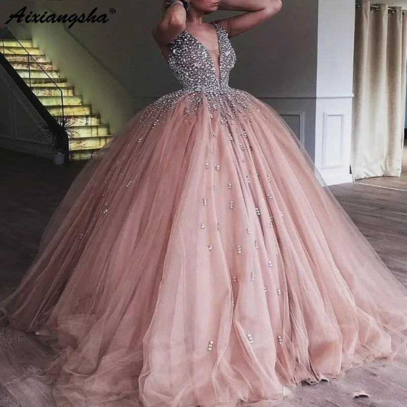 

Champagne Tulle Ball Gown Quinceanera Dress 2019 Elegant Heavy Beaded Crystal Deep V Neck Sweet 16 Dresses Prom Gowns