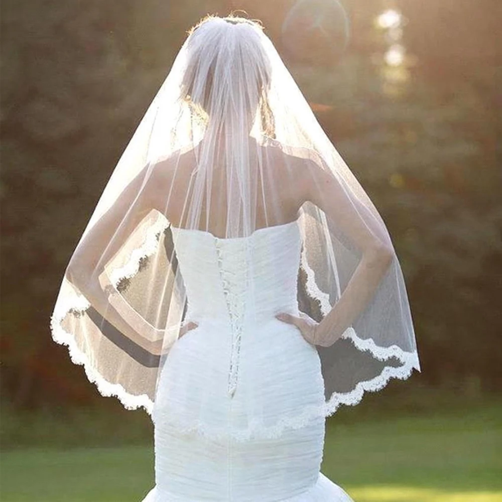 

Bride White Wedding Veil One-tier Fingertip Veils Lace Applique Edge With Comb Hot For Wedding Shows Artistic Photos