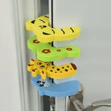 2016 New arrival 4PCS/LOT Cartoon Baby Safety Helper Door Stop Finger Pinch Guard Lock Random color