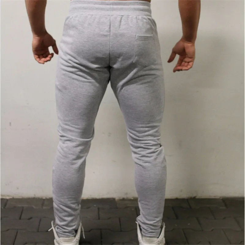 Yemeke Повседневное джоггеры Штаны Для мужчин пот Штаны Тощий высокая эластичность брендовый Спортивный Костюм Jogger Штаны мужские брюки