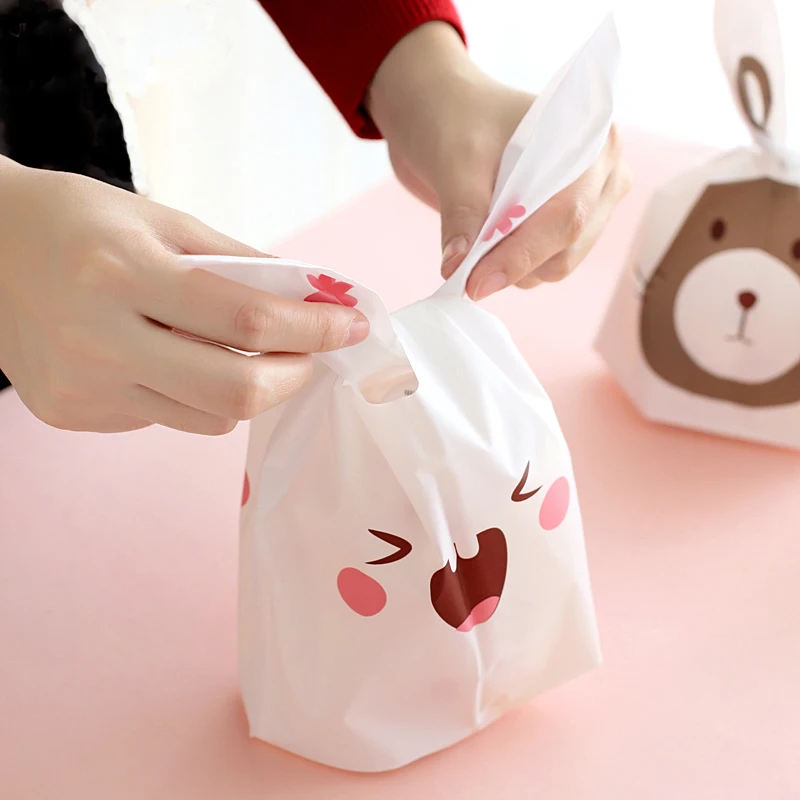 

50pcs Cute Bunny Cookie Bag Candy Cookies Plastic Gift Bag Birthday Wedding Favors Rabbit Ears Gifts Bags for Home Office