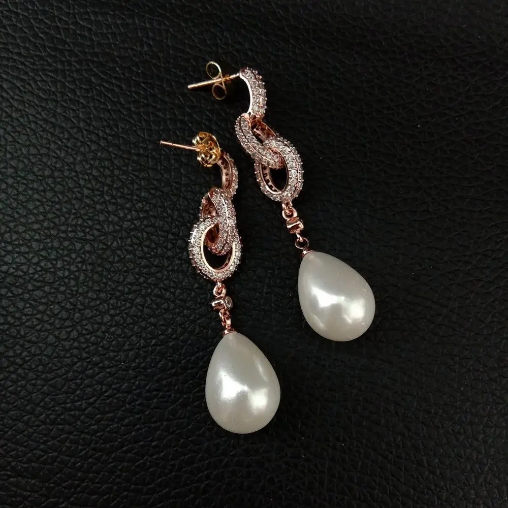 

Women's Teardrop White Sea Shell Pearl Rose Golden Plated Cz Pave Post Earrings
