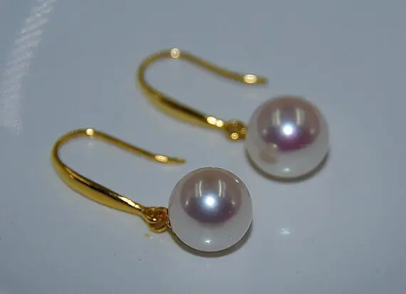 

A PAIR 11-12MM NATURAL SOUTH SEA WHITE PEARL EARRING