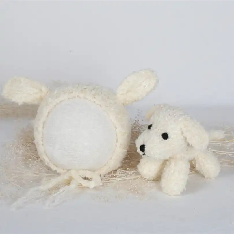 white knitted newborn hat