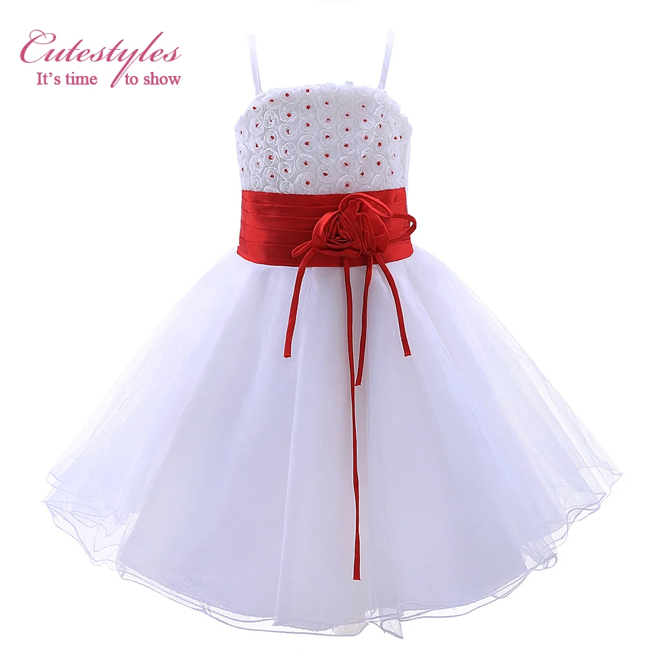white dress with red sash