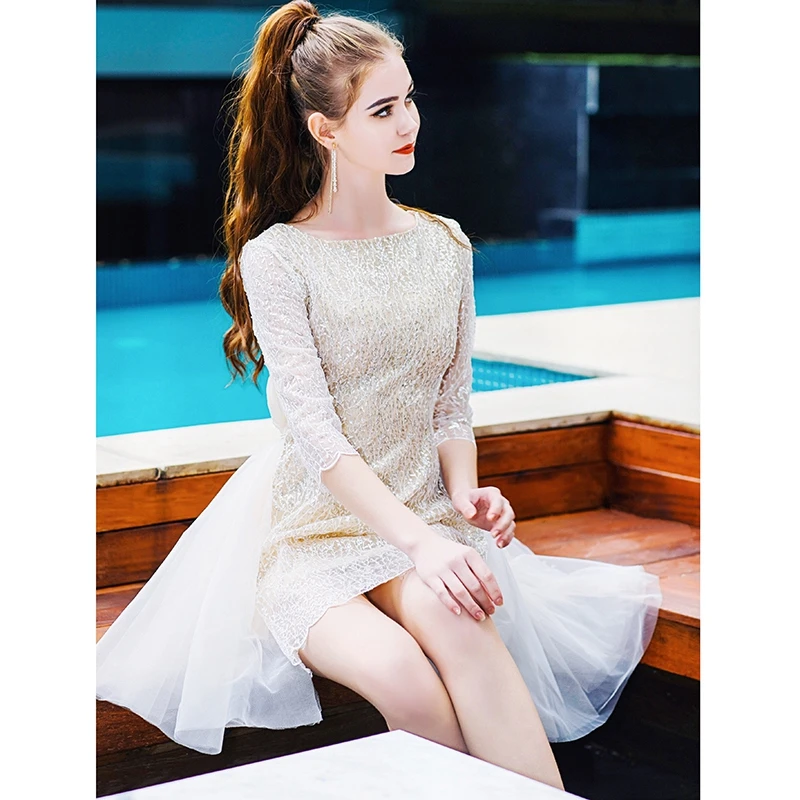 

2019 Three Quarter Sleeve Mini Sequined Cocktail Dresses Elegant Short Graduation Prom Gowns Illusion Scoop Neck Cocktail Gowns