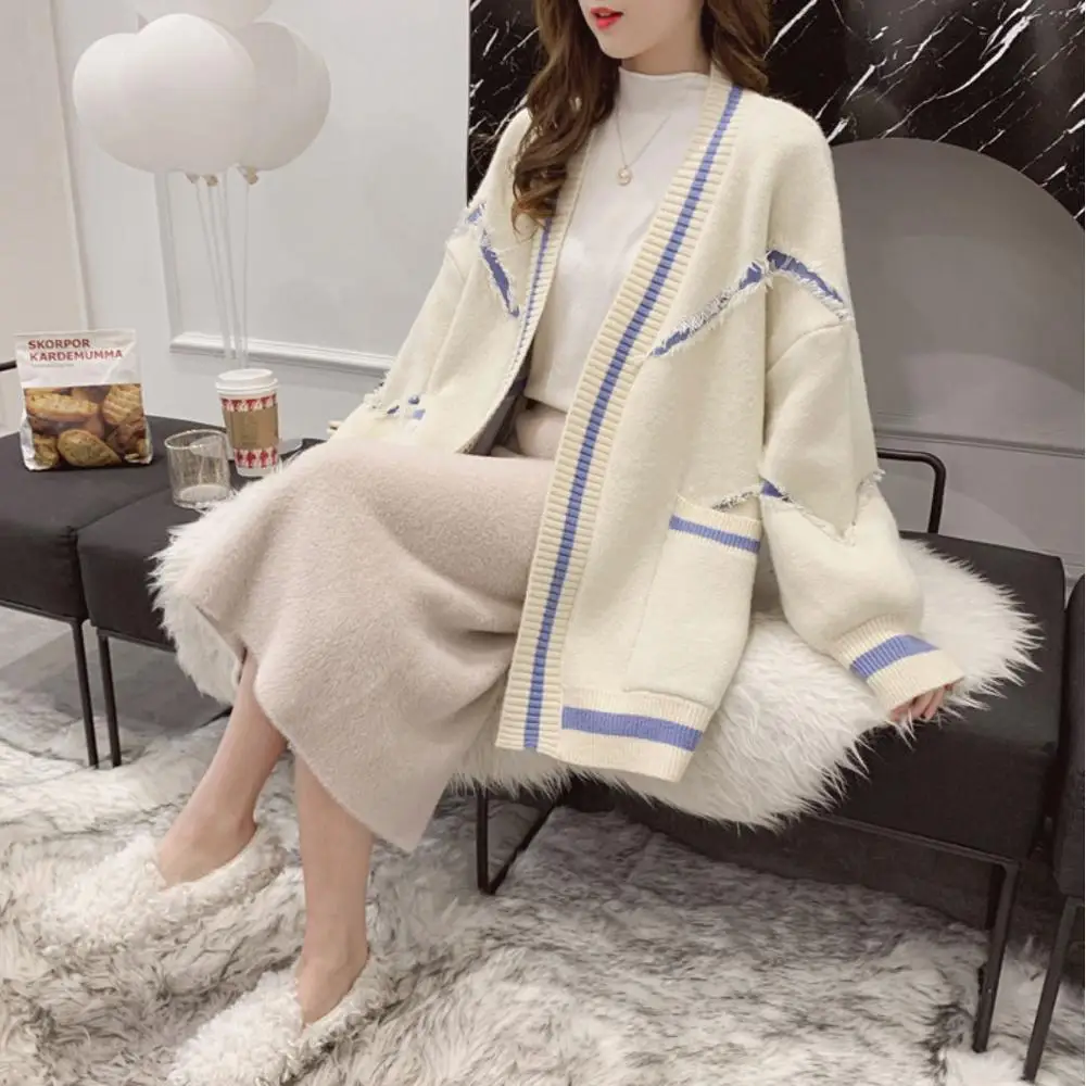 

2019 spring and Autumn New Knitted Sweater Cardigan Coat Female Long Section Color Matching Tassel Sweater Shirt blouse