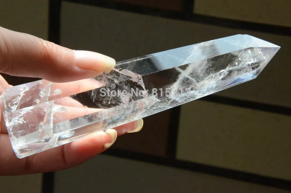

ddh00893 HIMALAYAN CLEAR QUARTZ CRYSTAL POINT WITH STONE INSIDE MANIFESTOR