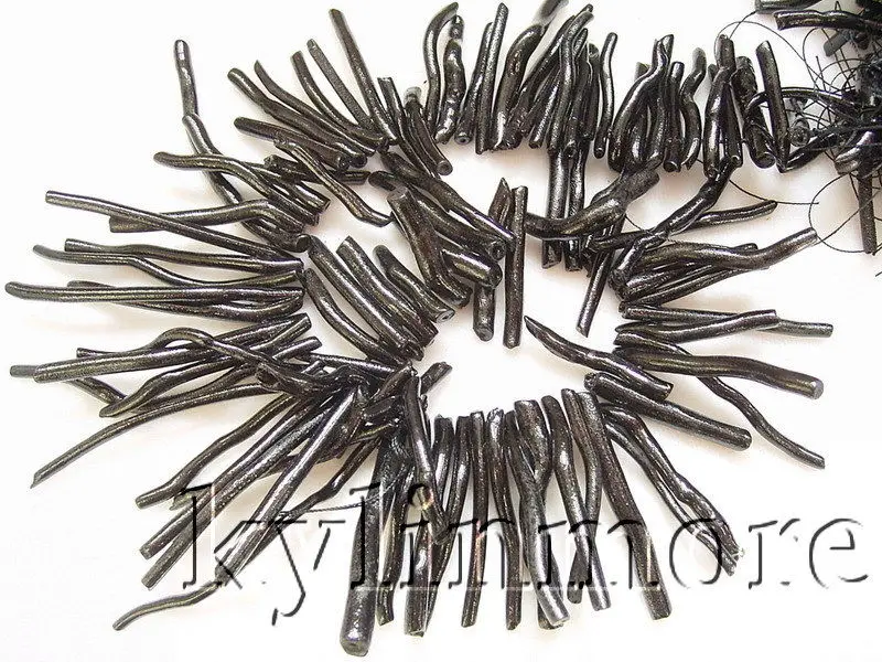 

8SE04051 4x35-4x50MM Black Coral Fancy Beads 15.5''