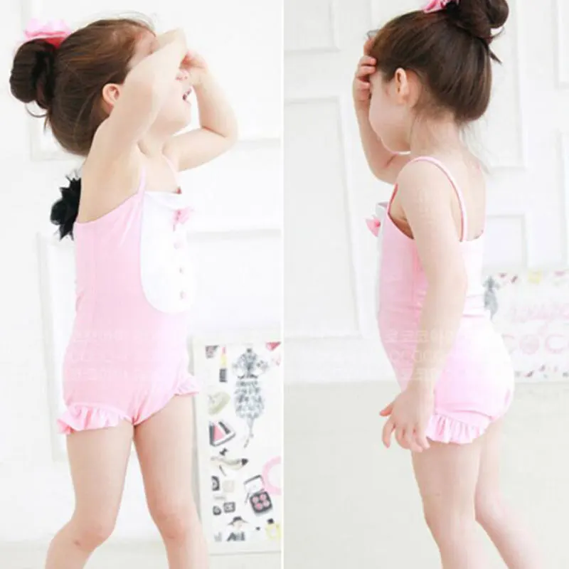 The new children conjoined pink swimwear girls bow swimsuit hot springs
