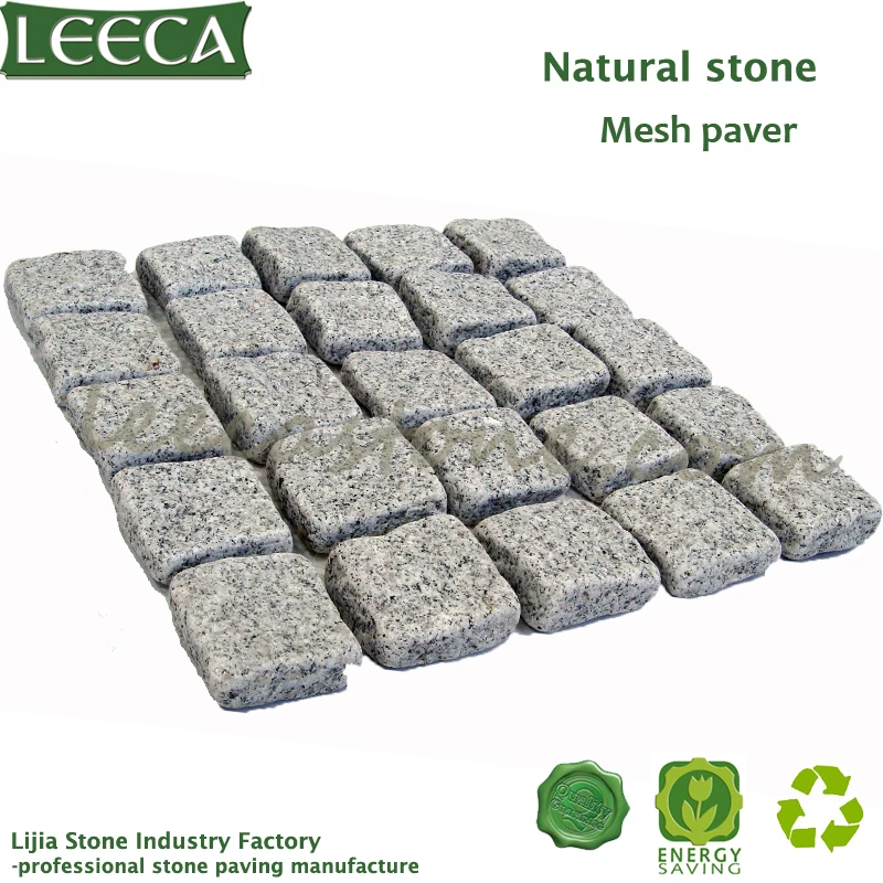 Light gray granite natural paver cobblestone mat on
