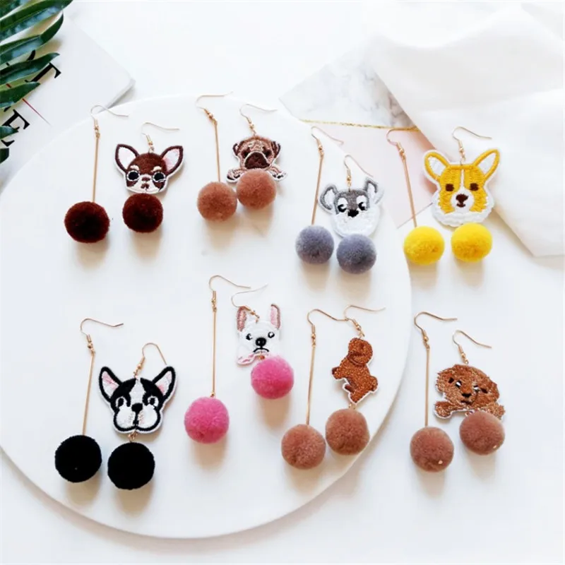 

Accessories Earrings factory wholesale animal animals Teddy dog fur ball asymmetric earrings without pierced ear clip wholesale