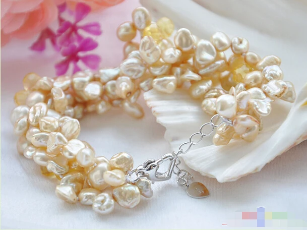 

A P4501 4row 8~9" champagne lamina keshi pearl drip faceted citrine bracelet