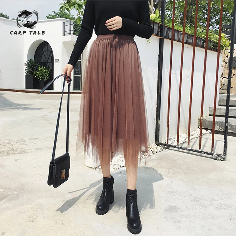 

2019 autumn and winter high waist irregular velvet mesh pleated skirt long section gold velvet skirt on both sides wear women
