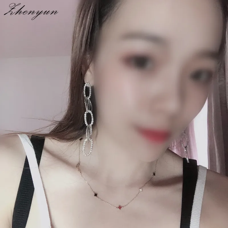 ZHENYUN 2 шт./компл. моды мотаться металл + циркон Для женщин длинные волны серьги