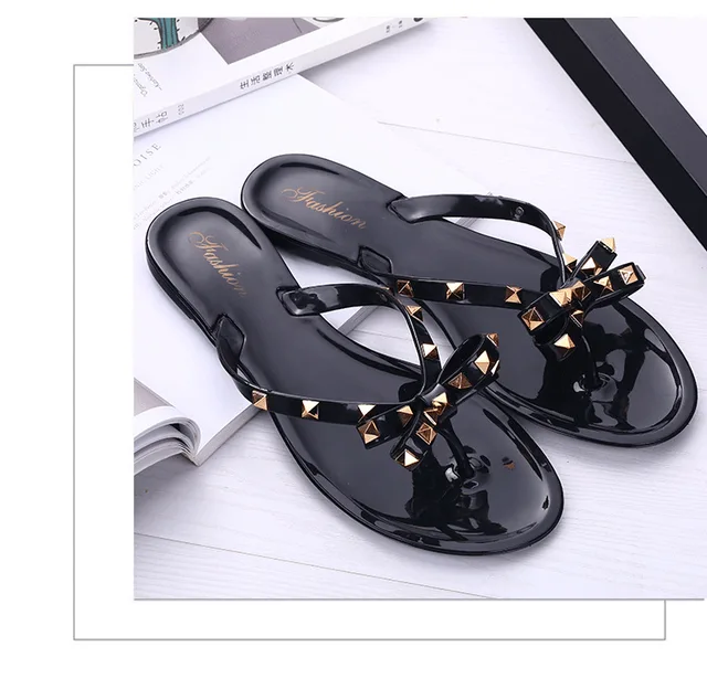 2019 new slippers female summer fashion rivet bow flip flops wear wild flat jelly shoes sandals 2019 new slippers female summer fashion rivet bow flip flops wear wild flat jelly shoes sandals and slippers
