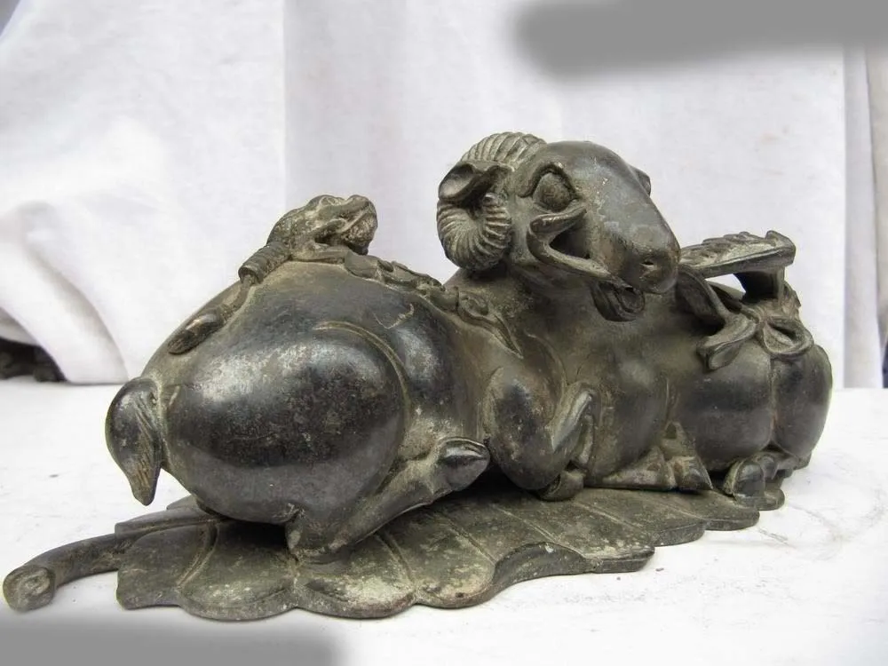 

Chinese classic Copper bronze Carved FengShui wealth goat Sheep Hold RuYi Statue