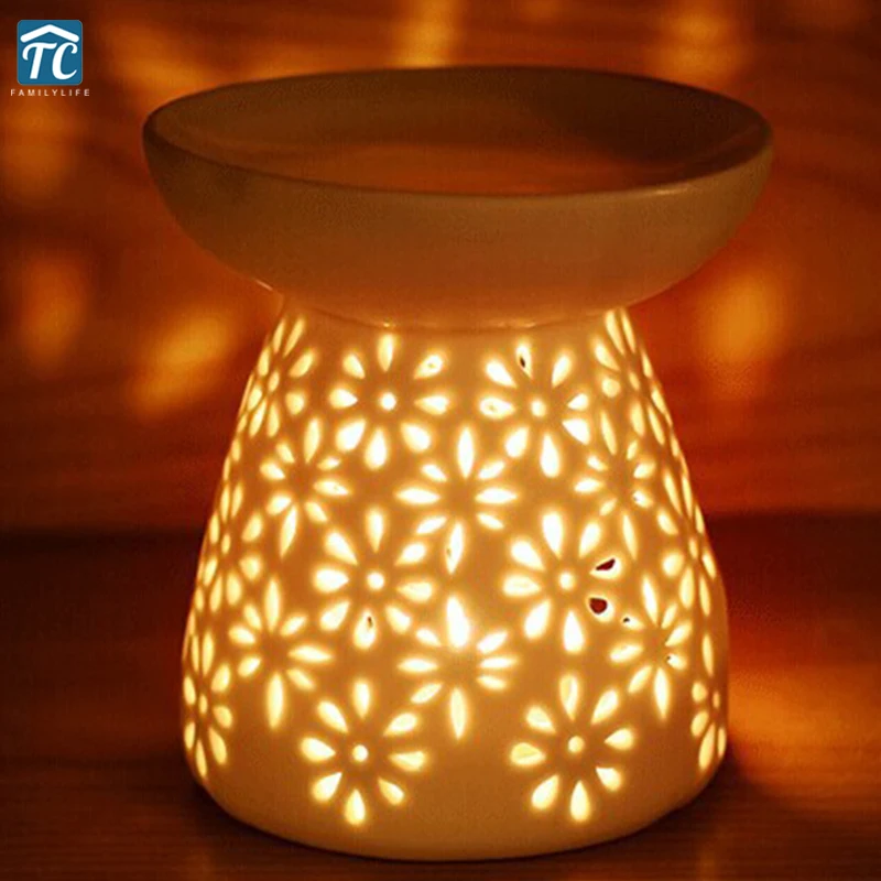 

White Ceramic Hollow Out Grass Essence Oil Lamp 10*9.5CM Aroma Stove Smokes Incense Burner Essential Oil Candle Furnace