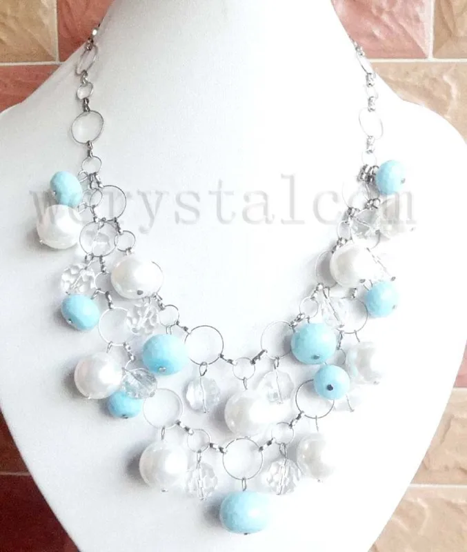 

Nice 16mm White Mother of Pearl Clear Crystal Blue Porcelain Faceted Necklace