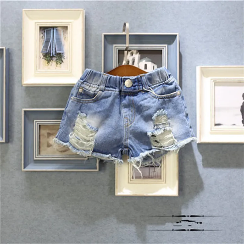 Летние модные новые джинсовые штаны для маленьких девочек Повседневная хлопковая детская одежда однотонные рваные штаны для детей от 2 до 6 лет, Лидер продаж