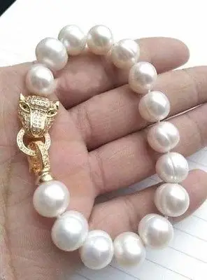 

Shipping >> fs rbt 11-13MM NATURAL SOUTH SEA BAROQUE WHITE PEARL BRACELET 7.5-8'' Leopard Clasp