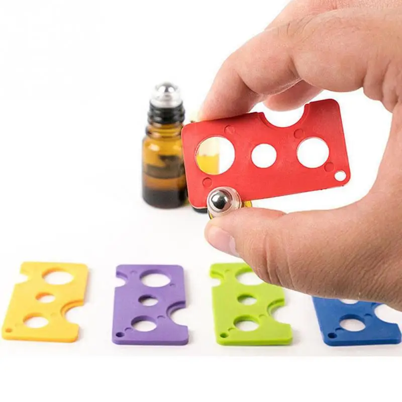 

Essential Oil Opener Key Tool Remover For Roller Balls and Caps Bottles 80*40mm