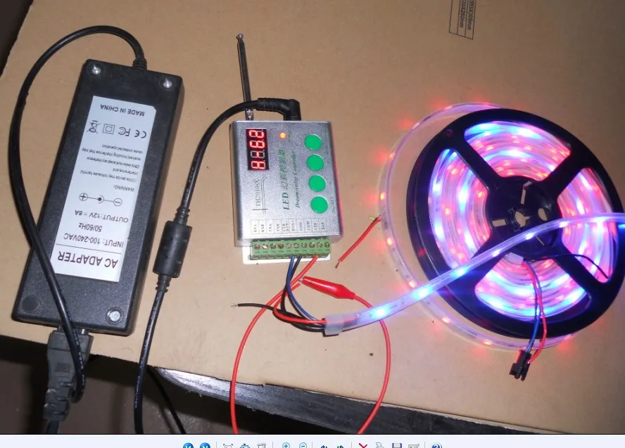 

RF controller+12V/5A power adaptor+5m led digital strip,DC12V input,WS2811IC10pcs IC and 30pcs 5050 SMD RGB each meter