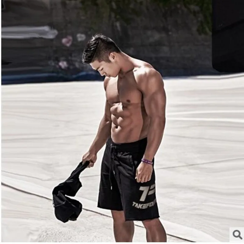 

Summer hot brand 2019 sports stretch training short running loose trend pants casual fashion jogging men's five pant move men