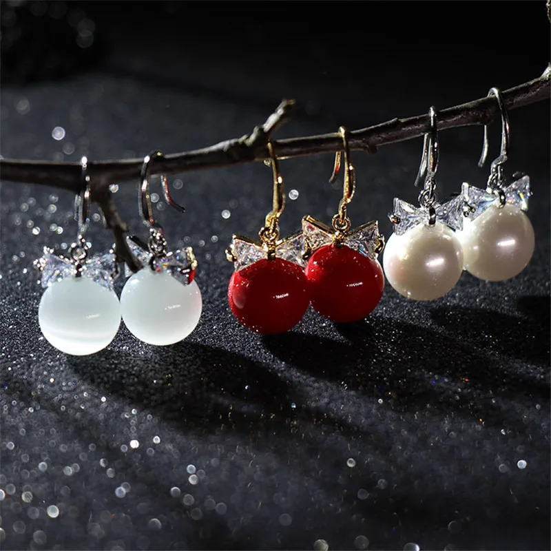 

ZN Fashion Cat Eye Stone Temperament Dangle Earrings Elegant Rhinestone Bow Zircon Crystal Pendant Long Drop Earring For Women