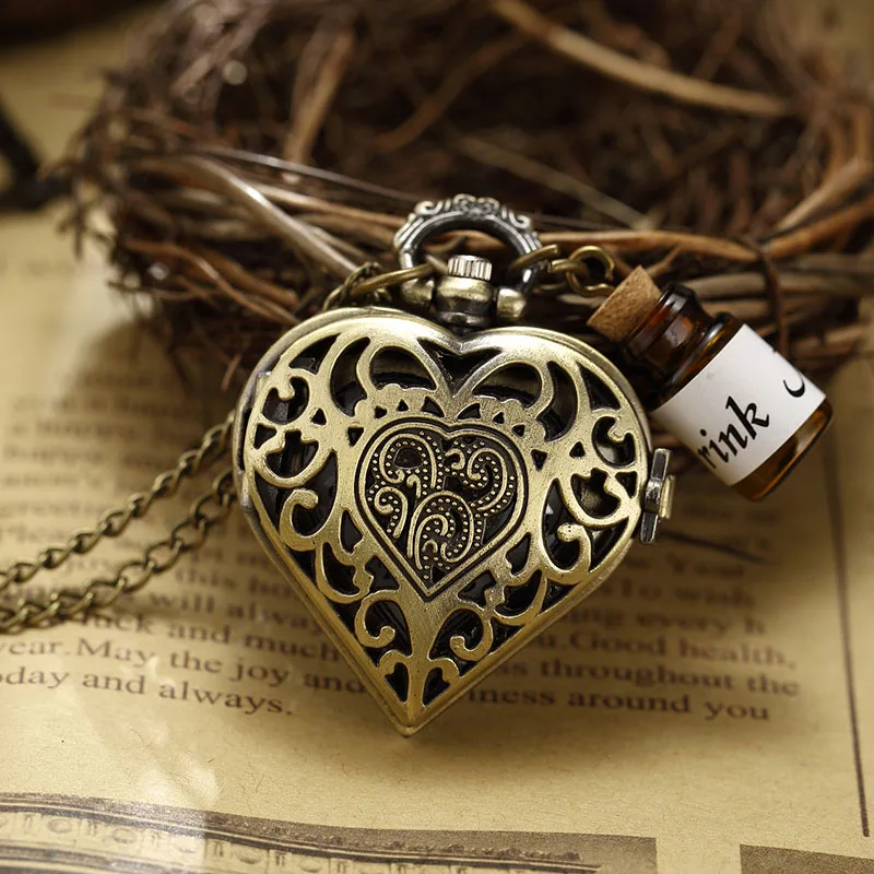 Retro Bronze Hollow Heart Shape Drink Me Bottle Quartz Skeleton Pocket