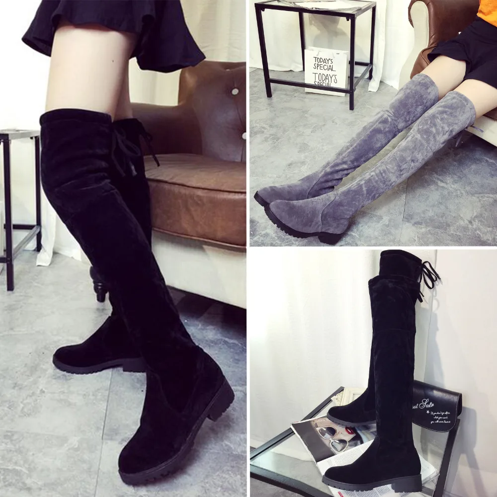tall over the knee flat boots