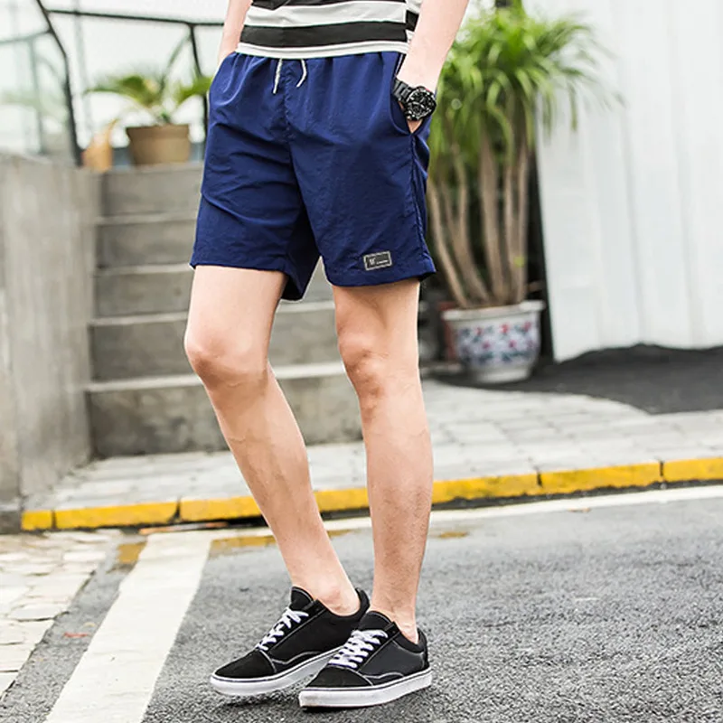 Мужские спортивные короткие брюки с эластичным шнурком для тренировок на весну и лето TH36